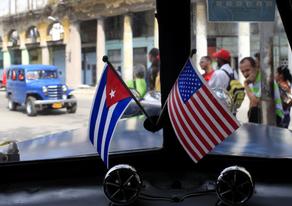 Image: cuban-and-us-flags.jpg