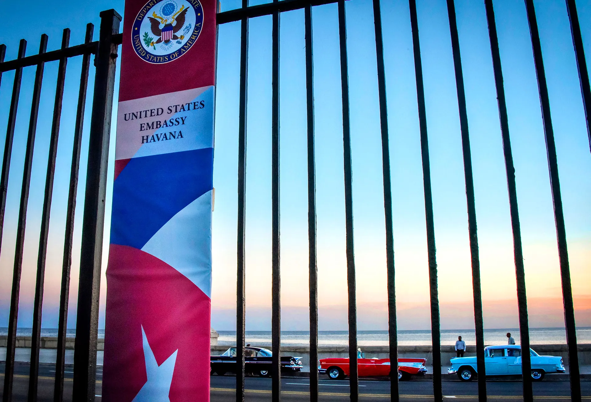 A photograph of the U.S. Embassy in Havana overlooking the beach